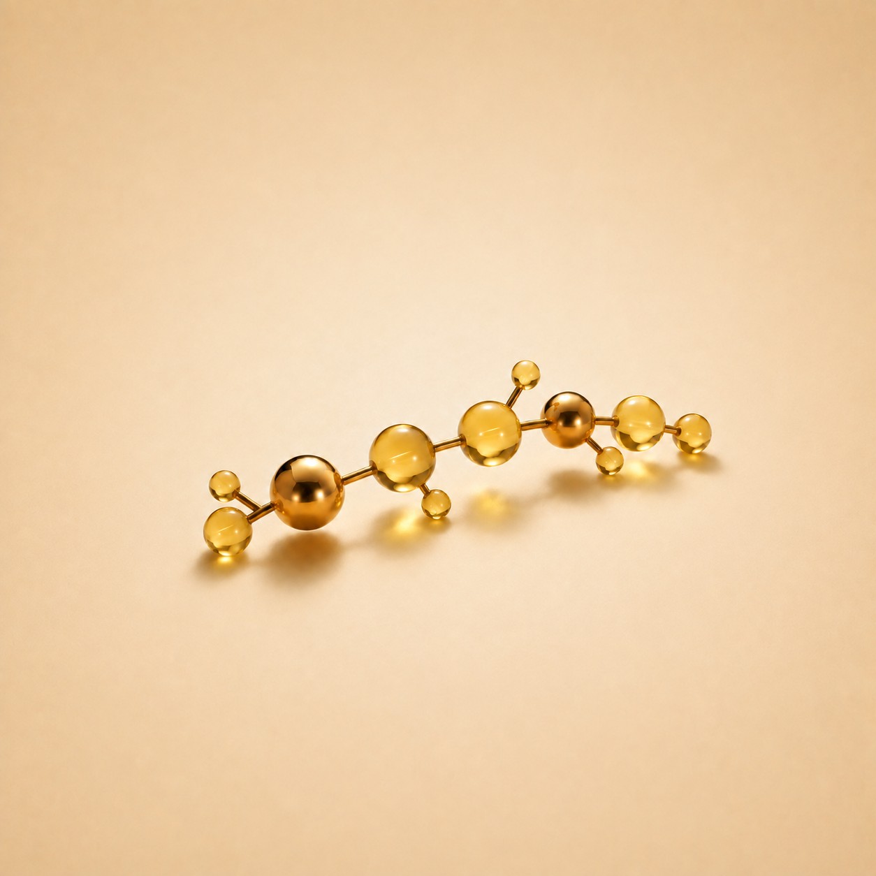 A short peptide chain rendered as linked gold spheres against a warm backdrop